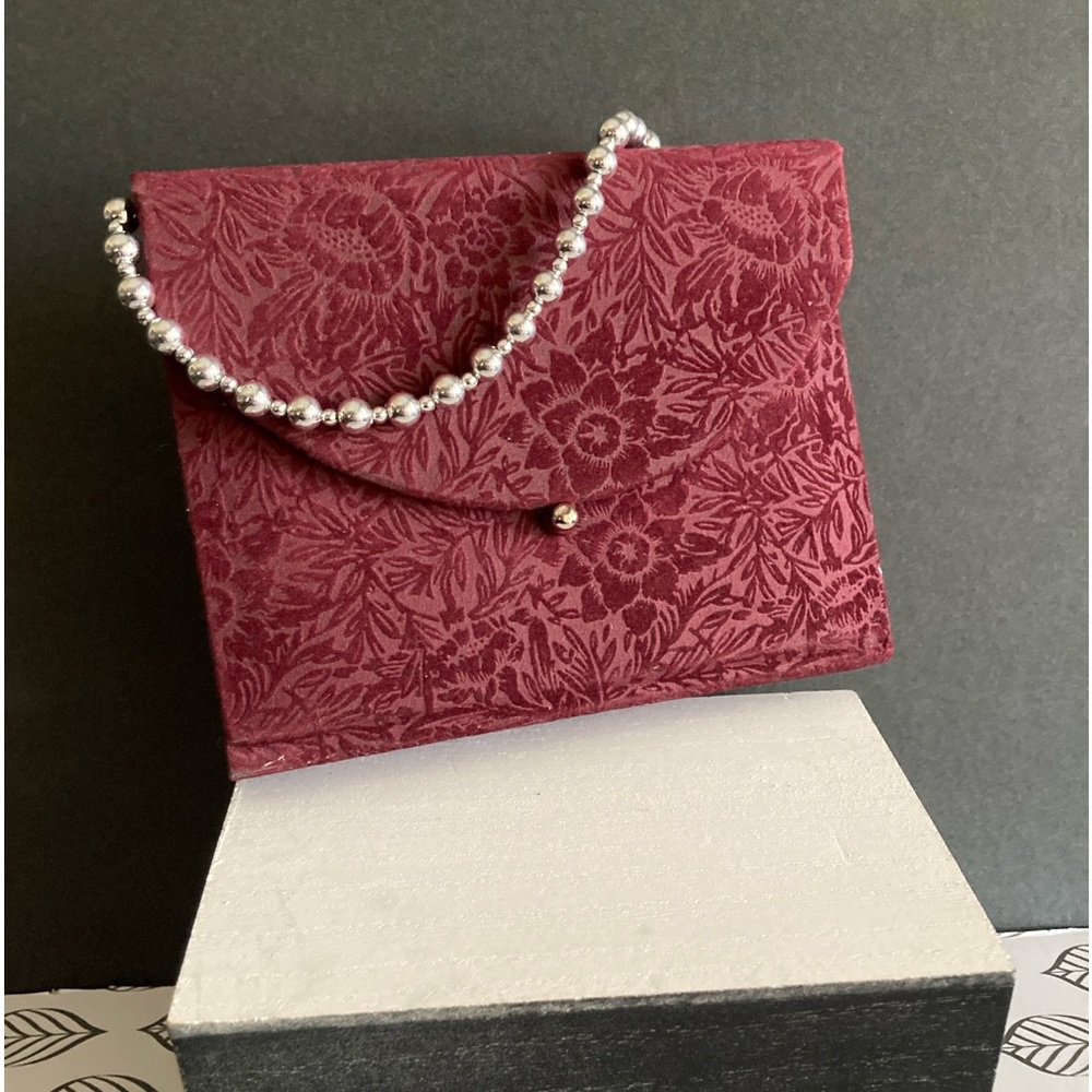 New seasons purse like photo album.